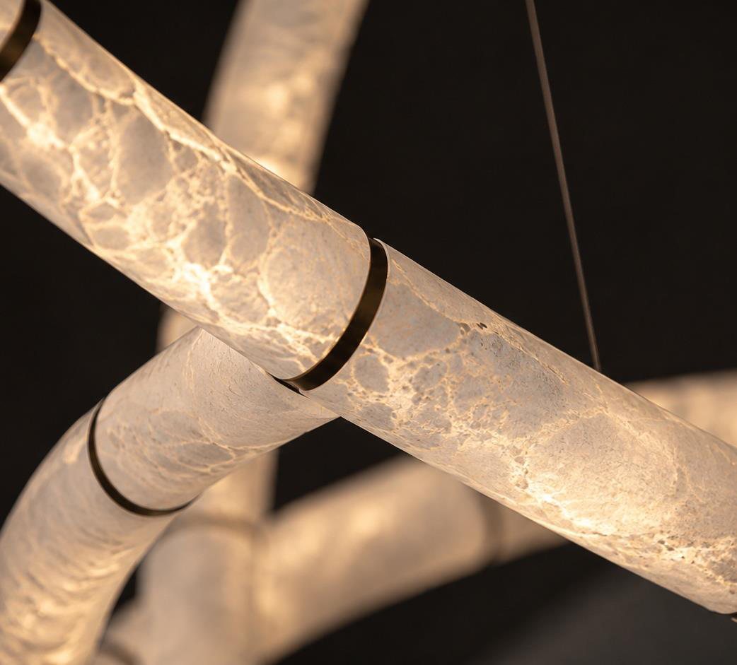Illuminated alabaster modules joined at a metal collar
